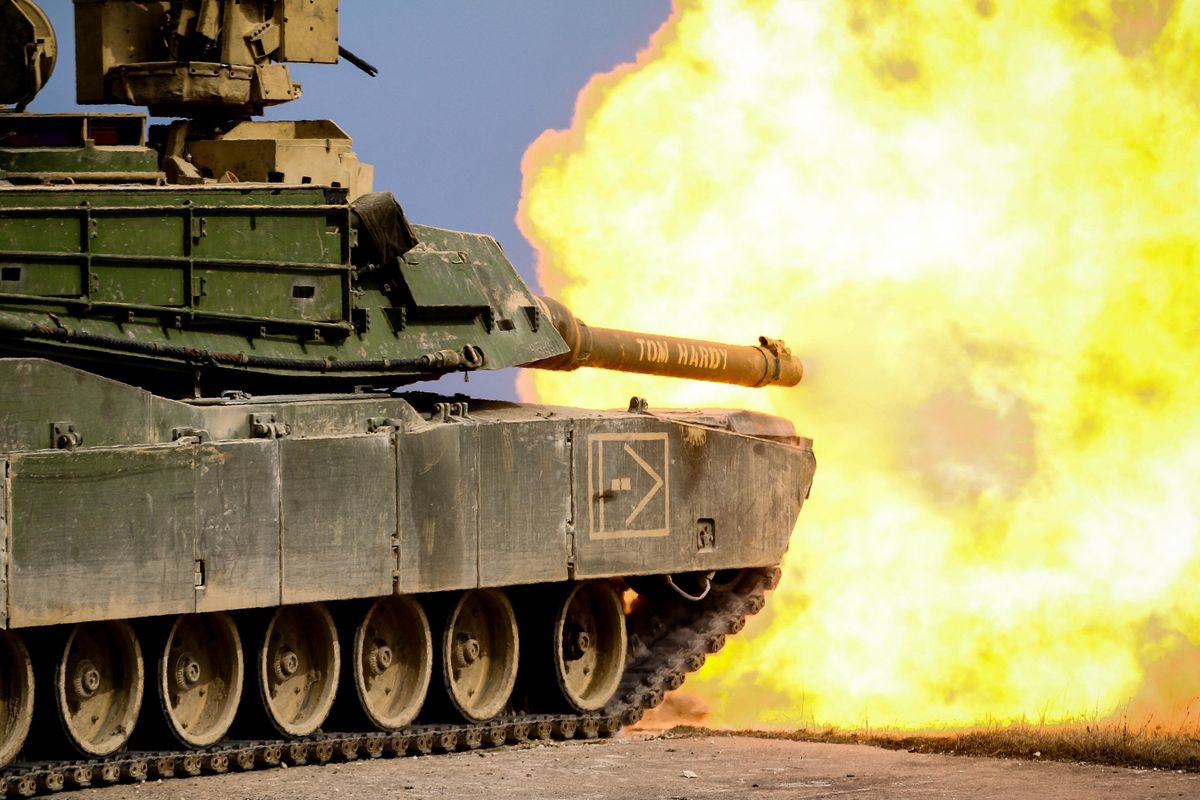 A US M1 Abrams tank fires a round during a live-fire exercise in Germany.