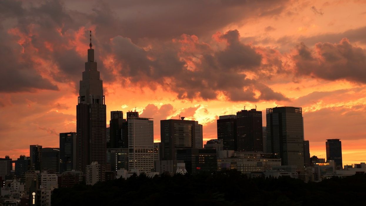 A view of the skyline and buildings at Shinjuku district during sunset in Tokyo, Japan June 20, 2021.