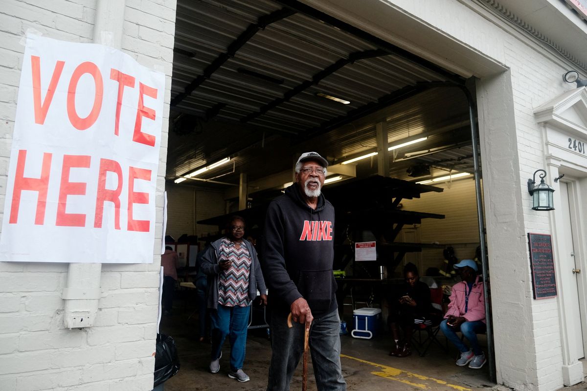  A voter exits a polling station in Selma, Alabama. 
