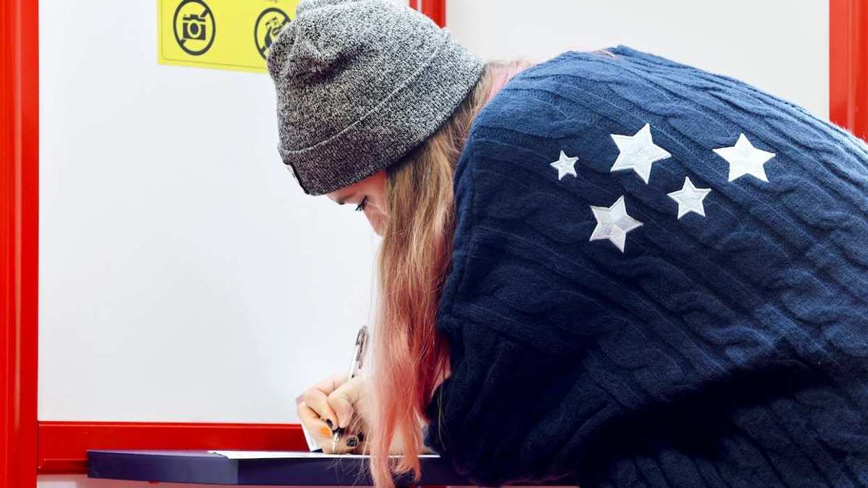 A woman votes on Election Day, in Arden, North Carolina, on November 5, 2024.