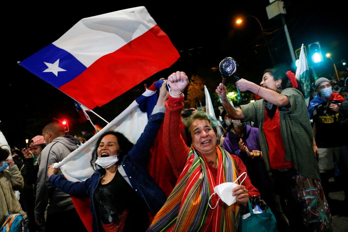 A "yes" supporter reacts to the result of Chile's national referendum on a new constitution in Valparaíso. Reuters