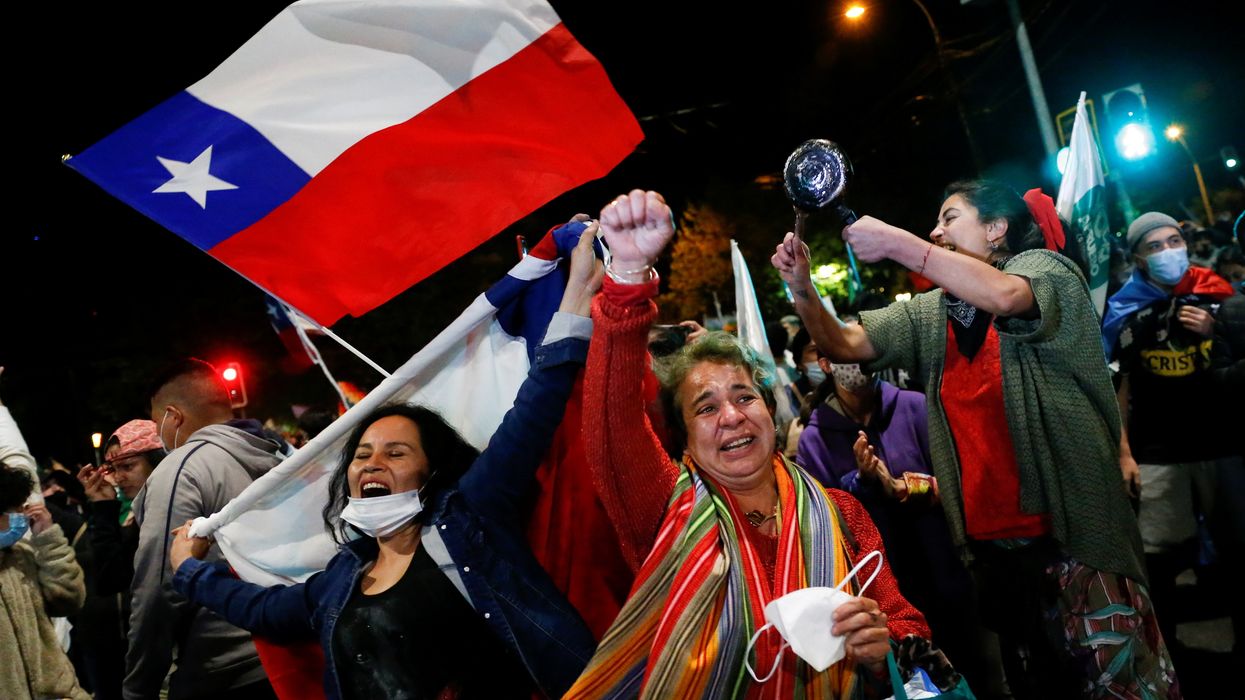 A "yes" supporter reacts to the result of Chile's national referendum on a new constitution in Valparaíso. Reuters