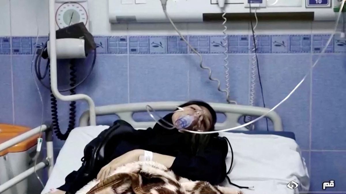 A young woman lies in hospital after reports of poisoning at an unspecified location in Iran in this still image from video from March 2, 2023.