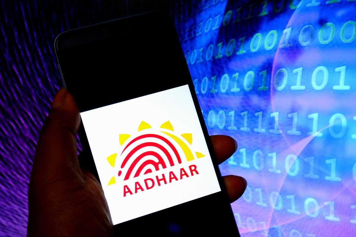 Aadhaar logo seen displayed on a smartphone.