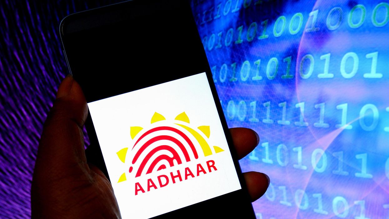 Aadhaar logo seen displayed on a smartphone.