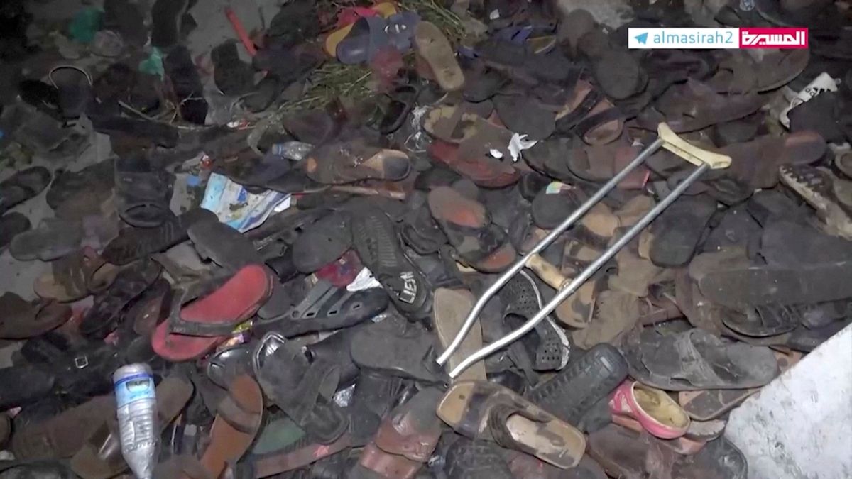 Abandoned footwear and other belongings lie on the ground after a stampede in Sanaa, Yemen.