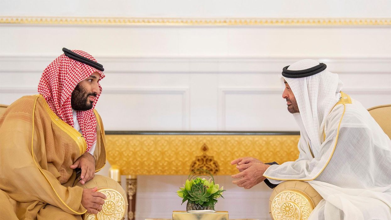 Abu Dhabi's Crown Prince Sheikh Mohammed bin Zayed al-Nahyan talks with Saudi Arabia's Crown Prince Mohammed bin Salman Al Saud in Abu Dhabi, UAE, November 22, 2018.