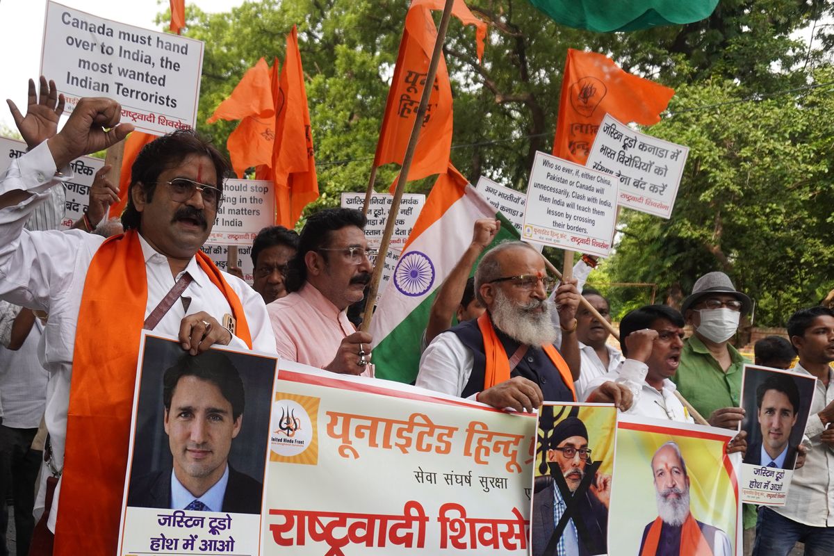 Activists from the United Hindu Front shout slogans during a protest against Canadian PM Justin Trudeau in New Delhi, India 