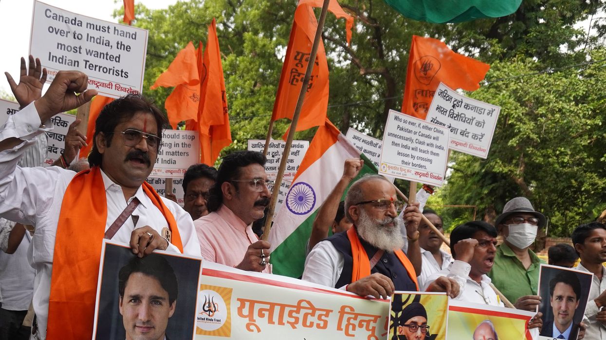 Activists from the United Hindu Front shout slogans during a protest against Canadian PM Justin Trudeau in New Delhi, India