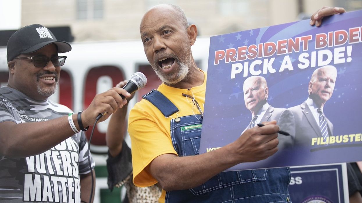 AJ McCampbell, Democrat state representative from Alabama's 71st district, calls on U.S. president Joseph R. Biden to "pick a side" on voting rights and the filibuster before a march in downtown Washington, D.C. from the African American History Museum to the White House on Wednesday, August 4, 2021.