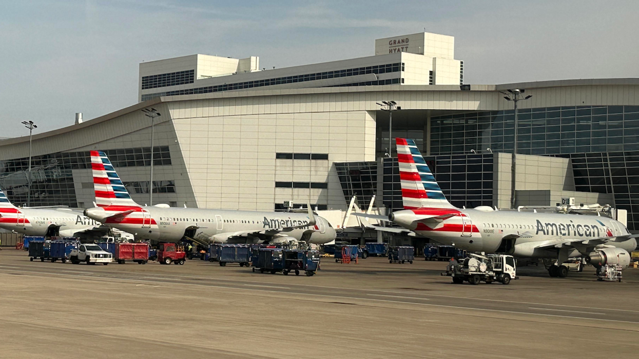 American Airlines planes parked at the terminal gates at the Dallas Fort Worth International Airport.