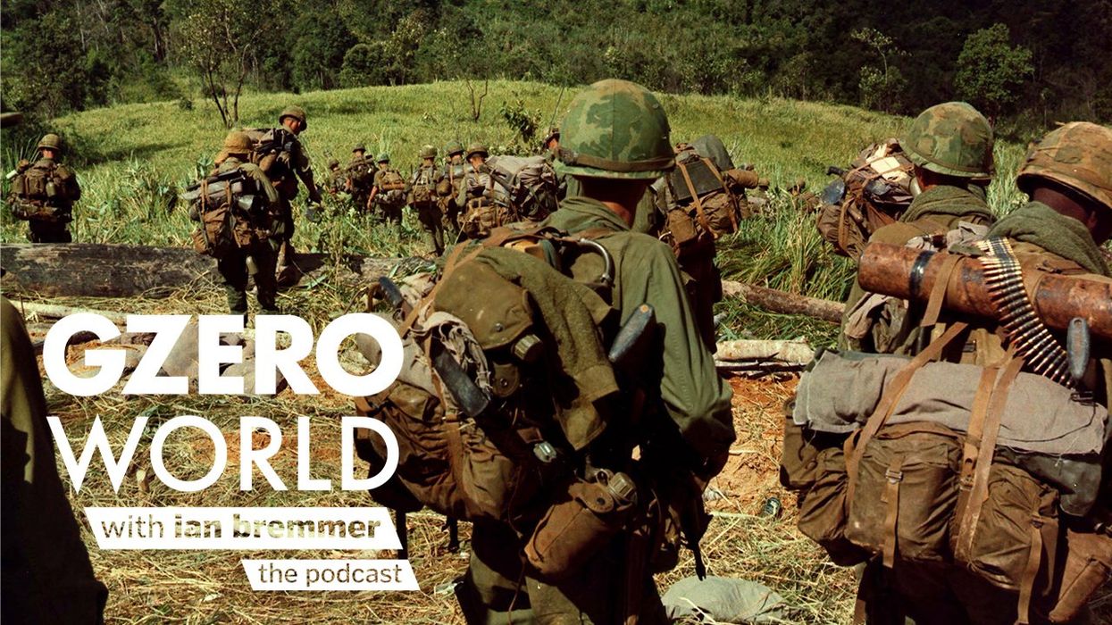 American soldiers trek through dense jungle terrain during the Vietnam War, carrying heavy packs and weapons. Text art reads "GZERO World with Ian Bremmer – the podcast."