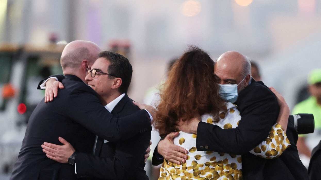 Americans released in a swap deal between the U.S. and Iran arrive in Doha.