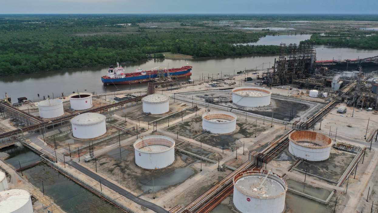 An aerial view of an oil tanker and storage tanks at Exxon Mobil’s Beaumont oil refinery, which produces and packages Mobil 1 synthetic motor oil, in Beaumont, Texas, U.S., March 18, 2023.