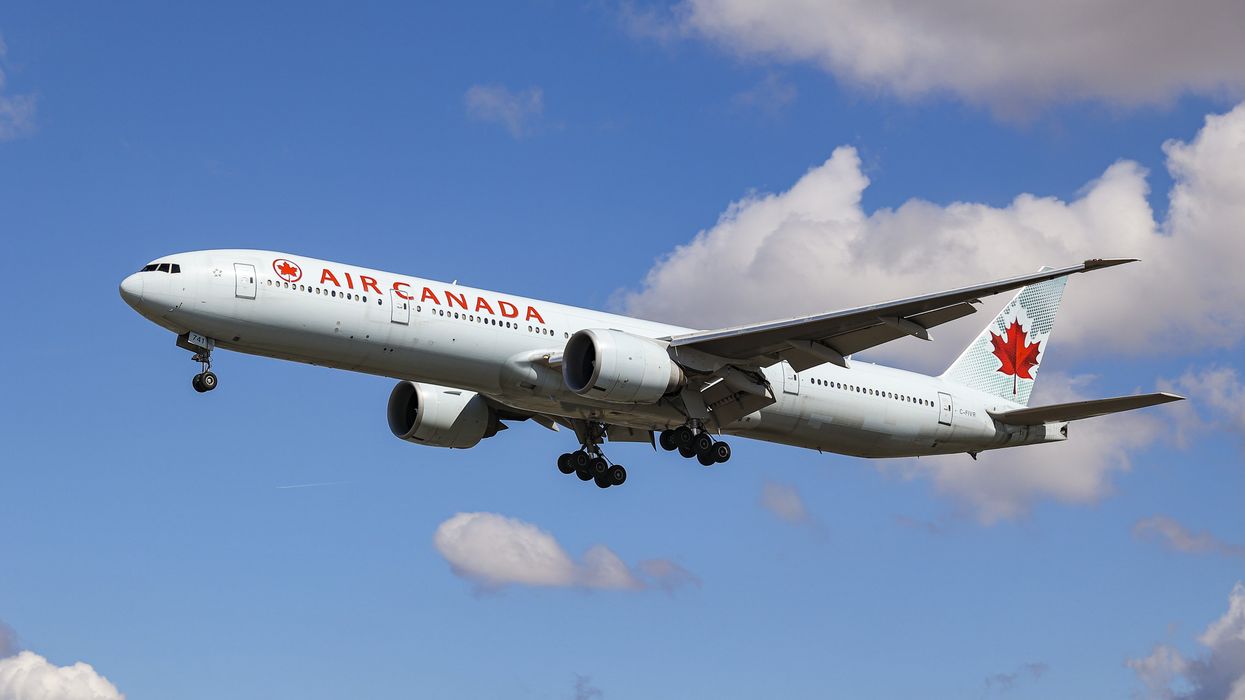 An Air Canada Boeing 777-300ER aircraft approaching the runway at Heathrow Airport in London.