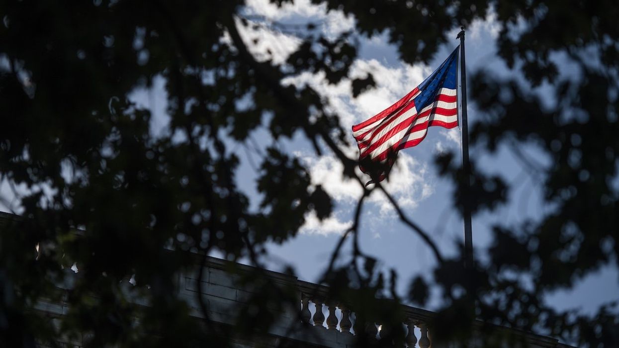 An American flag flies atop Russell Senate Office Building on Capitol Hill.
