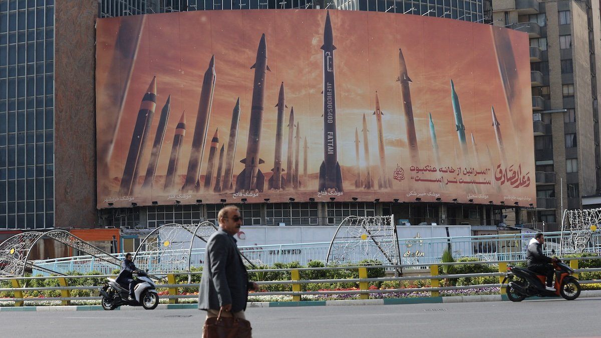 An anti-Israel billboard with a picture of Iranian missiles is seen in a street in Tehran, Iran April 15, 2024.