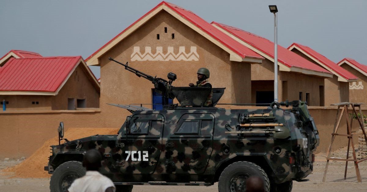 An armored vehicle of Nigerian Security Forces drives by newly built homes, ahead of the community re-opening ceremony which was destroyed by Boko Haram armed militants in 2015, in Ngarannam, Borno State, Nigeria, October 21, 2022. 