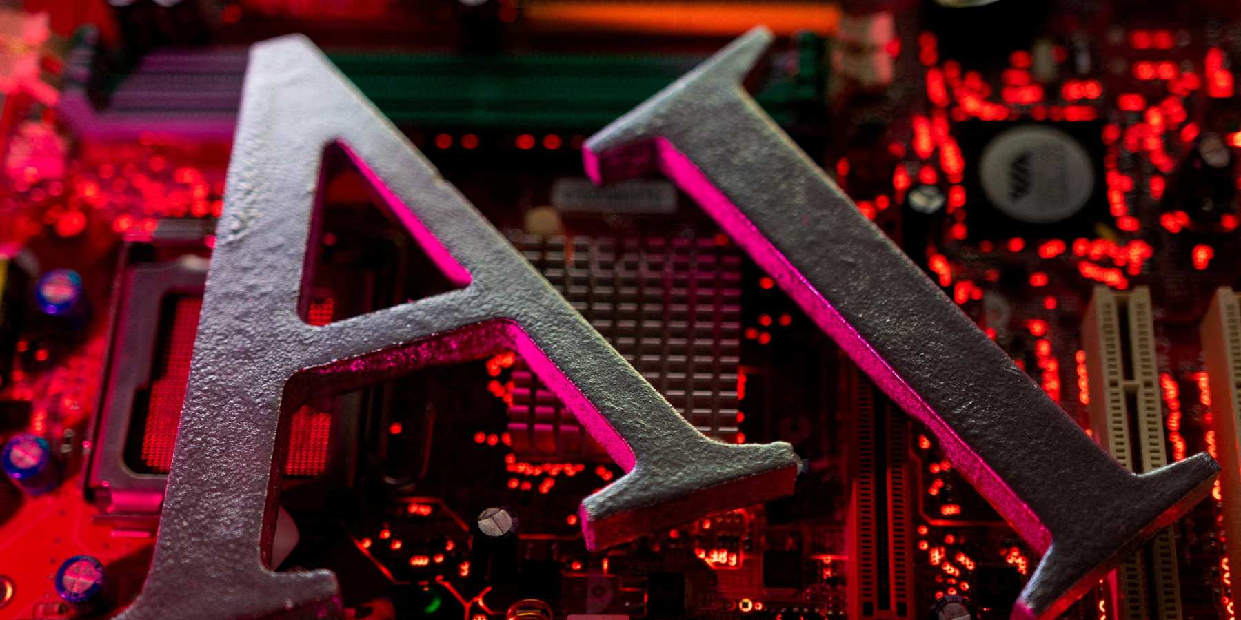 An illustration of AI atop a computer motherboard.