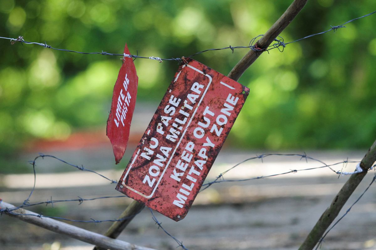 An improvised gate blocks the way leading to a Cuban military base near Bejucal.