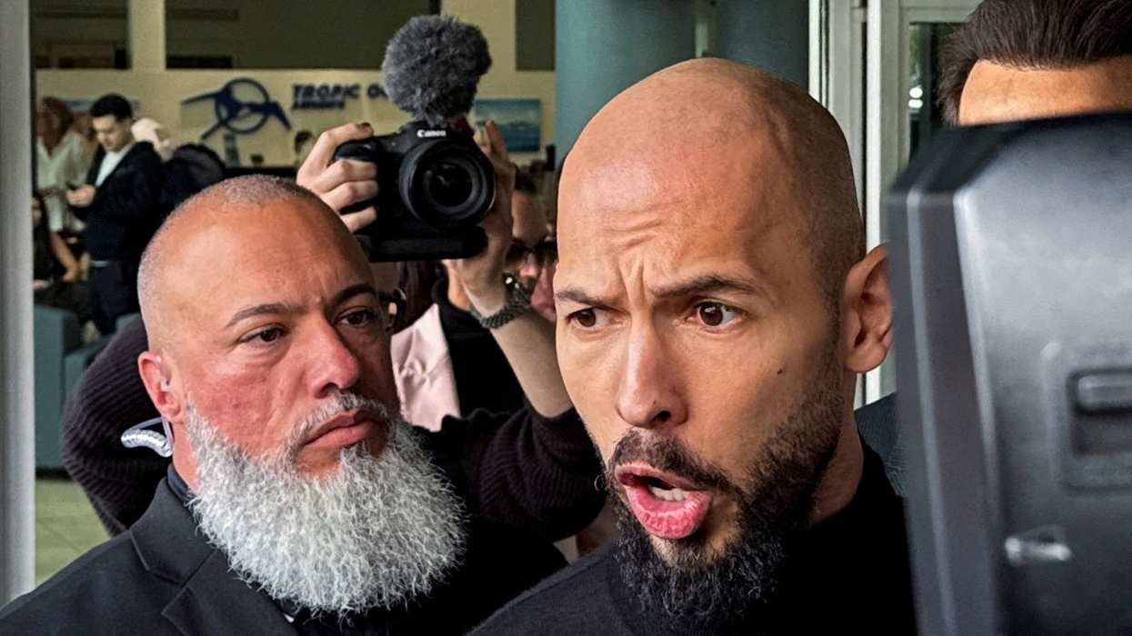 Andrew Tate speaks to the media upon arrival from Romania, after prosecutors lifted a travel ban related to criminal charges against him and his brother Tristan, in Fort Lauderdale, Florida, U.S. February 27, 2025.