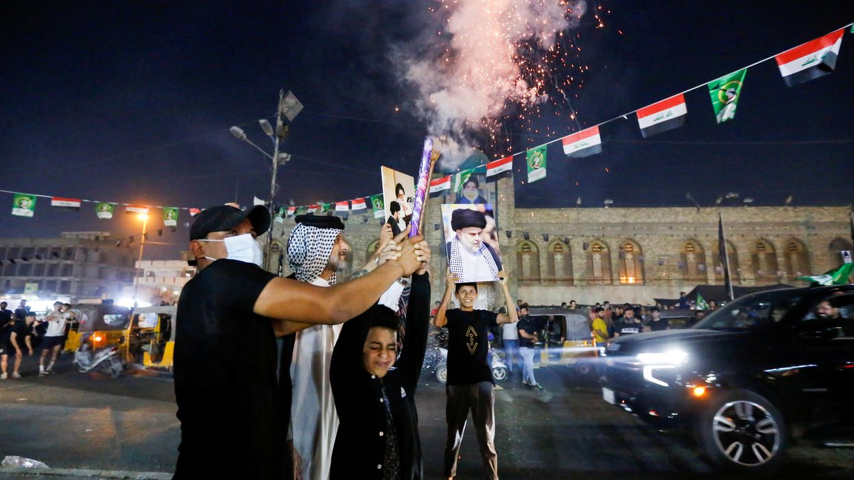 announced, in Sadr City, in Baghdad People celebrate on the street after preliminary results of Iraq's parliamentary election were announced, in Sadr City, in Baghdad, Iraq October 11, 2021