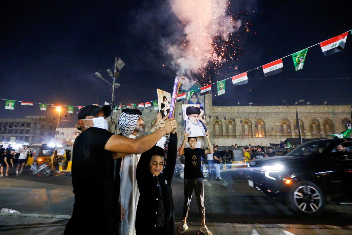 announced, in Sadr City, in Baghdad People celebrate on the street after preliminary results of Iraq's parliamentary election were announced, in Sadr City, in Baghdad, Iraq October 11, 2021
