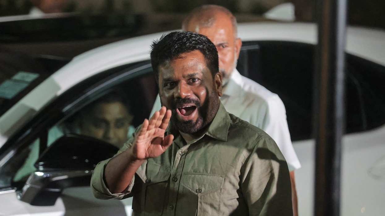 Anura Kumara Dissanayake, leader of the National People's Power (NPP) party, gestures after he claimed the victory in the presidential election, in Colombo, Sri Lanka, September 22, 2024.