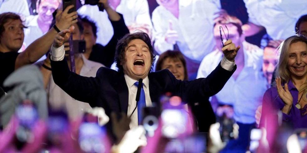 ​Argentina's President Javier Milei celebrates after the La Libertad Avanza party won the midterm election, which is seen as crucial for Milei's administration after U.S. President Donald Trump warned that future support for Argentina would depend on Milei's party performing well in the vote, in Buenos Aires, Argentina, October 26, 2025.