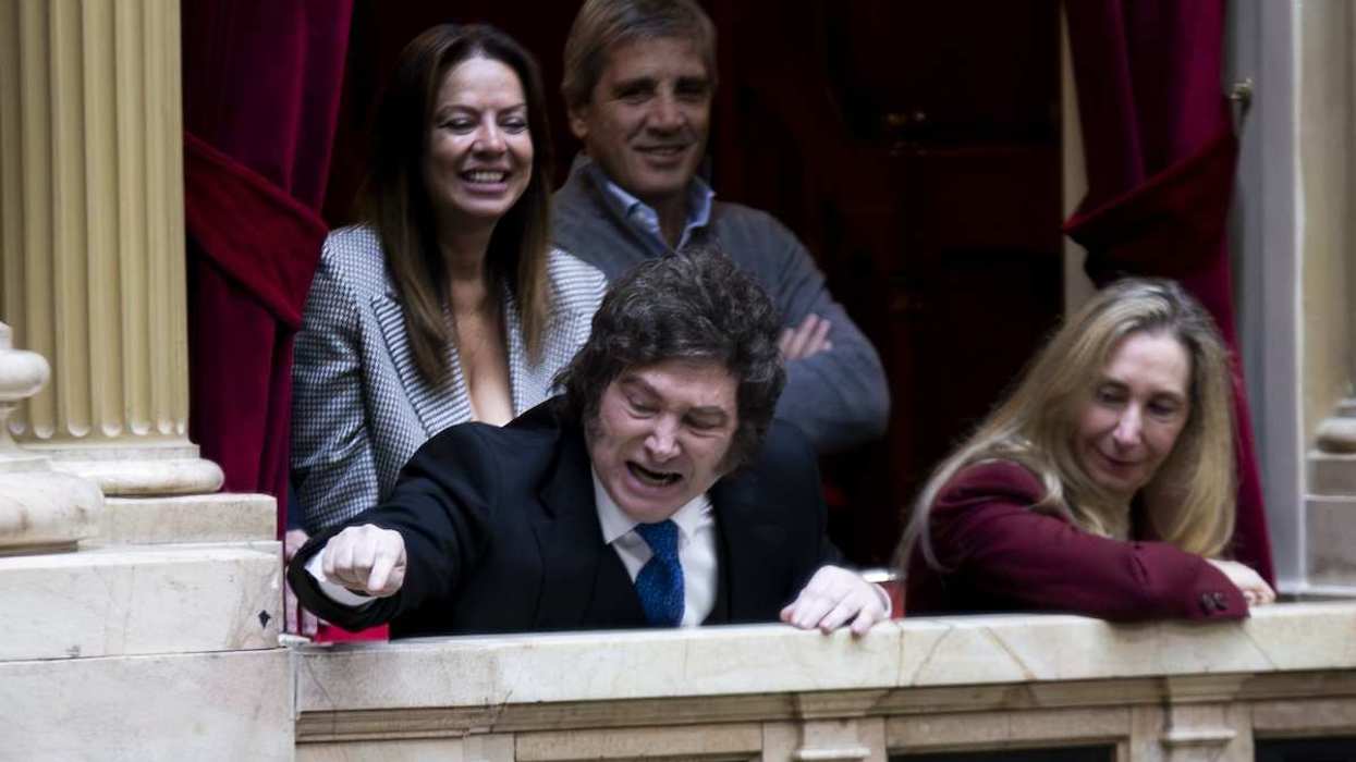 Argentina's President Javier Milei gestures in response to comments from deputies with Secretary of the Presidency Karina Milei, Minister of Human Capital Sandra Petovello, and Minister of Economy Luis Caputo.