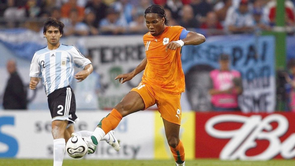 Argentina's Roberto Ayala and Ivory Coast's Didier Drogba during the World Cup in Hamburg, Germany, on June 10, 2006.