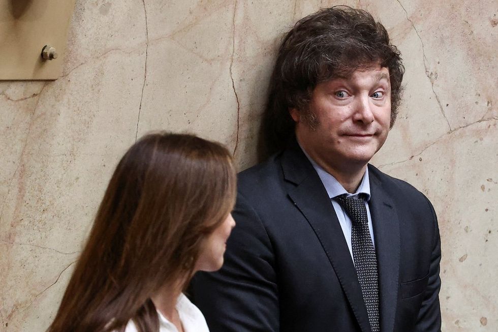 Argentine President-elect Javier Milei reacts next to Vice-President-elect Victoria Villarruel, before the session of the legislative assembly at the National Congress, in Buenos Aires, Argentina, November 29, 2023.