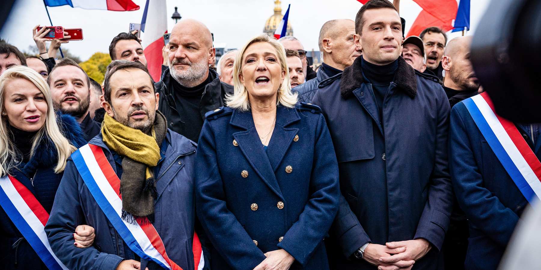 At a civic march against antisemitism in Paris this weekend, a far-right political procession saw Marine Le Pen, president and deputy of the Rassemblement National group (center) demonstrate along with her deputies, including Sebastien Chenu (left) and Jordan Bardella, president of the RN (right).