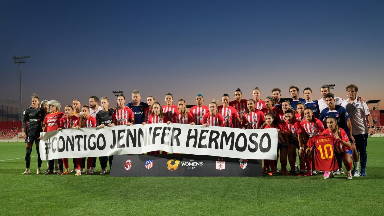 Atletico Madrid players and staff hold a banner in support of Spain's Jennifer Hermoso before the match as FIFA suspend President of the Royal Spanish Football Federation Luis Rubiales after the Women's World Cup Final.