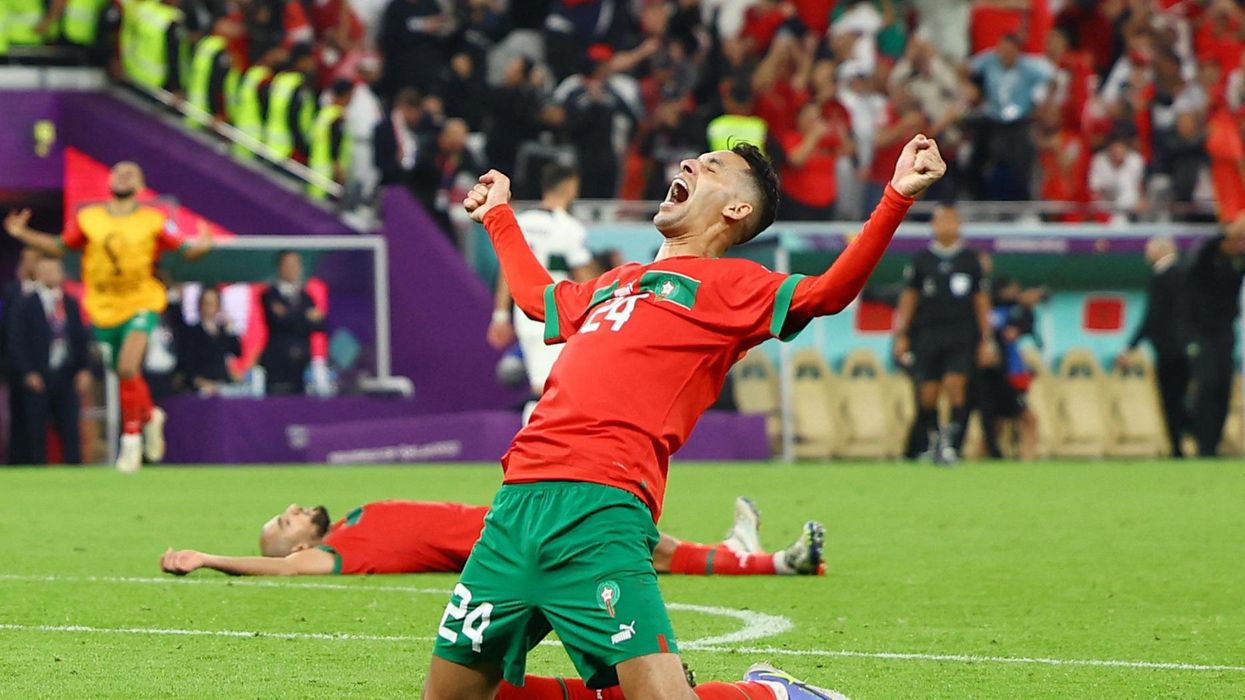 Badr Benoun celebrates after Morocco progress to the World Cup semi-finals in Qatar.