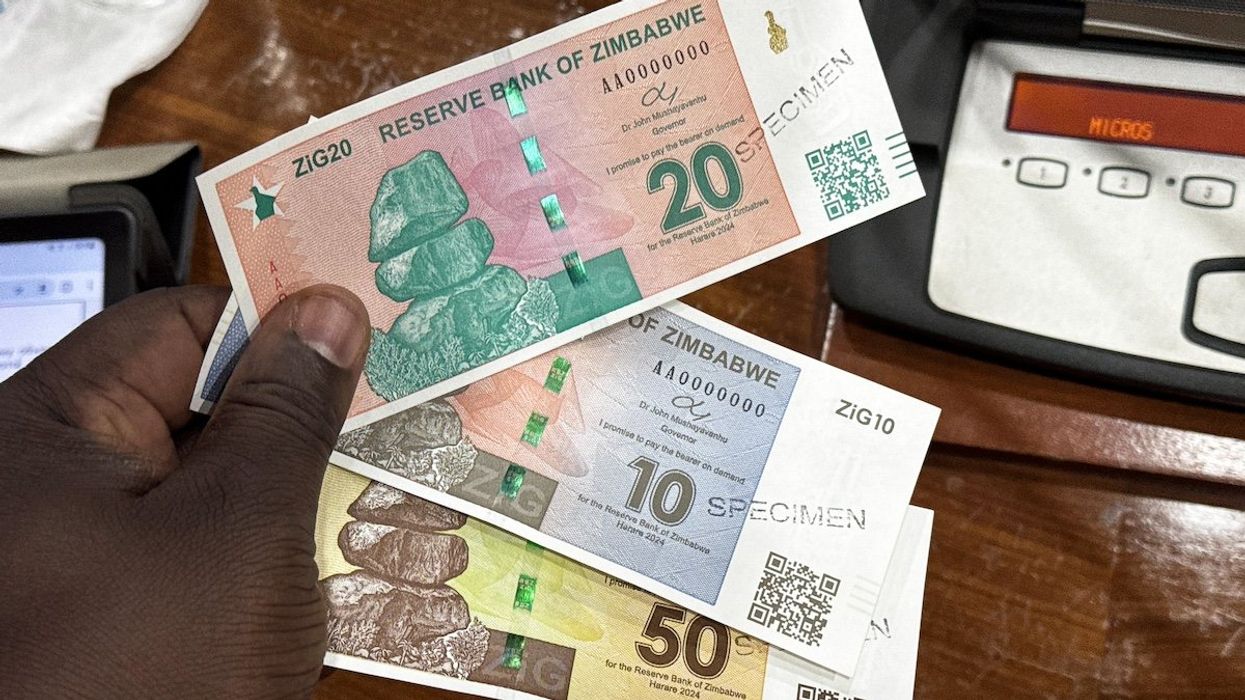 Banknotes of the new national currency Zimbabwe Gold, ZiG for short, are presented at a press conference of the Central Bank of Zimbabwe. Due to high inflation, Zimbabwe's central bank has introduced a new currency that is primarily linked to gold, but also to a number of other precious metals and foreign currencies.