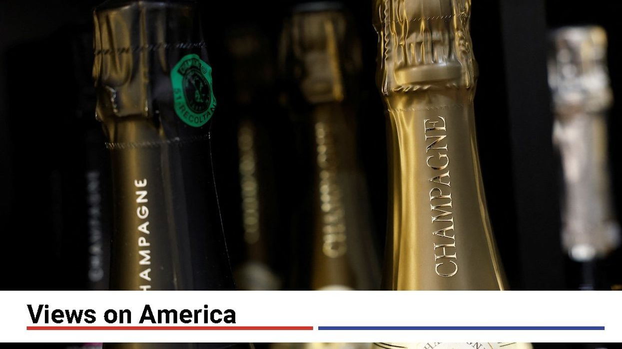 Bottles of Champagne are seen on display for sale in a wine shop in Paris, France, on March 13, 2025.