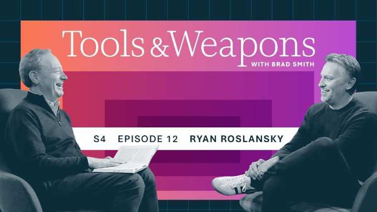 Brad Smith sitting with Ryan Roslansky and talking with a tools and weapons with Brad Smith logo in the background