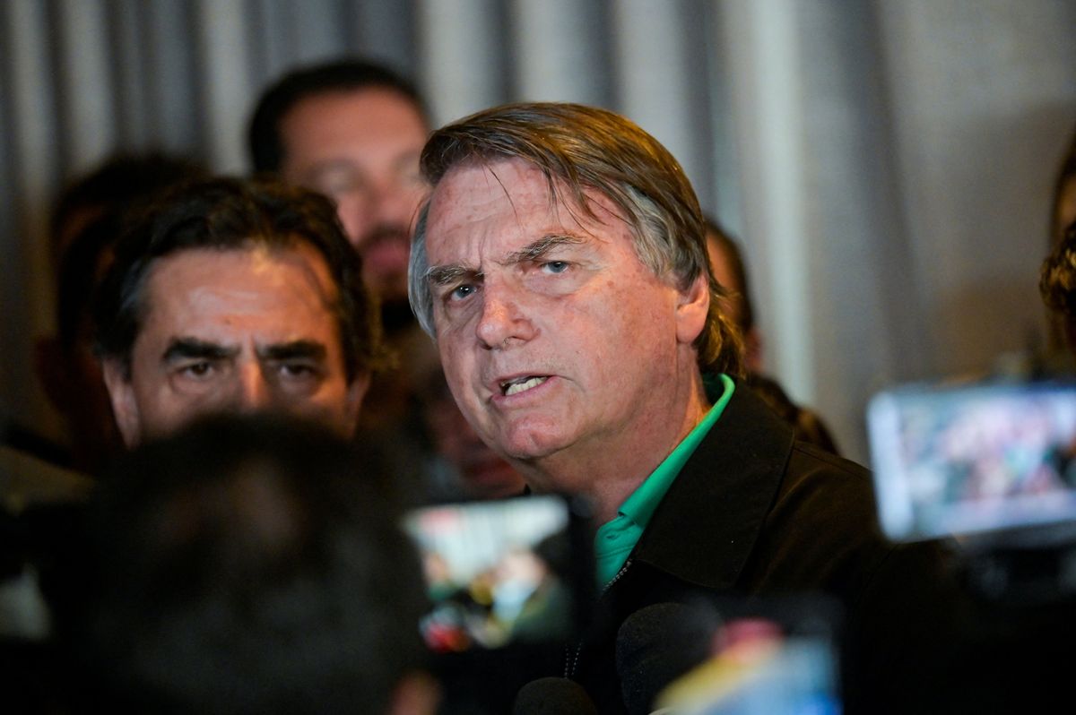 Brazil's former President Jair Bolsonaro talks with media 