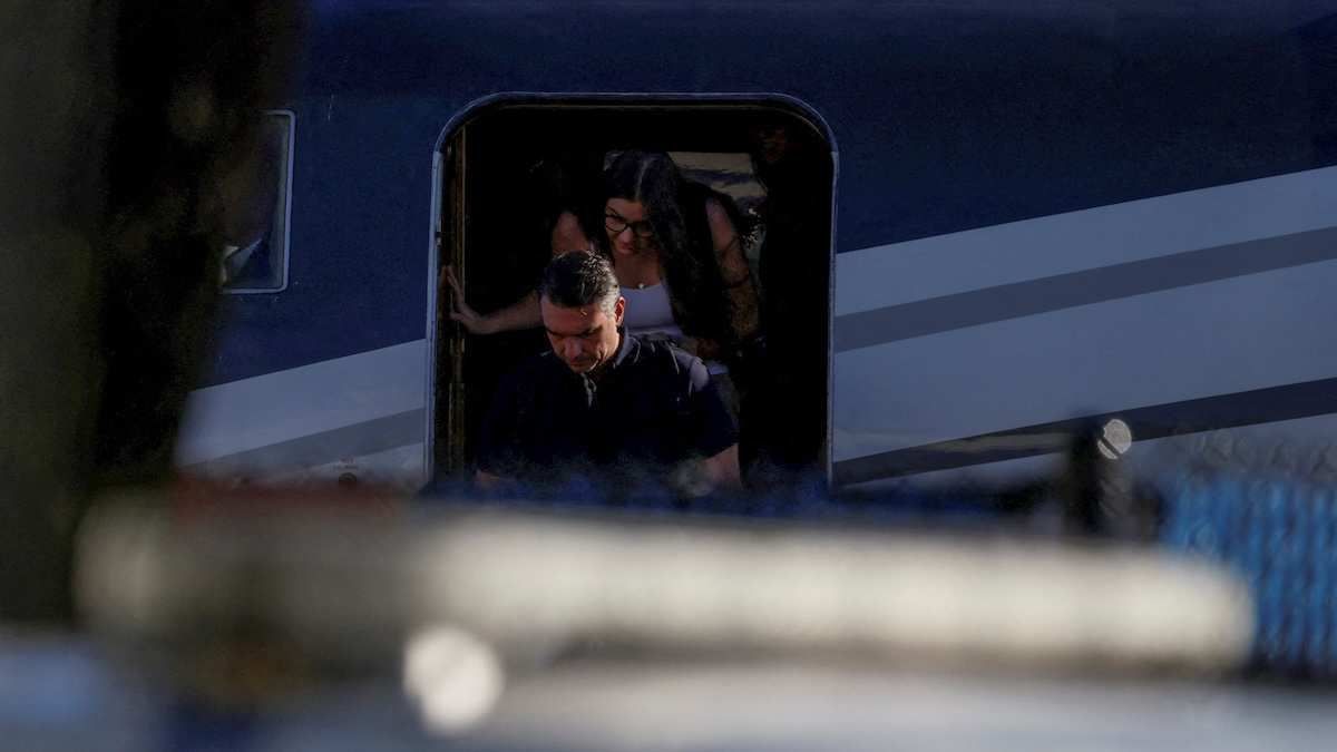 Brazilian Senator Flavio Bolsonaro disembarks from a plane after arriving at Opa-locka Executive Airport near Miami, Florida, U.S., October 28, 2026.