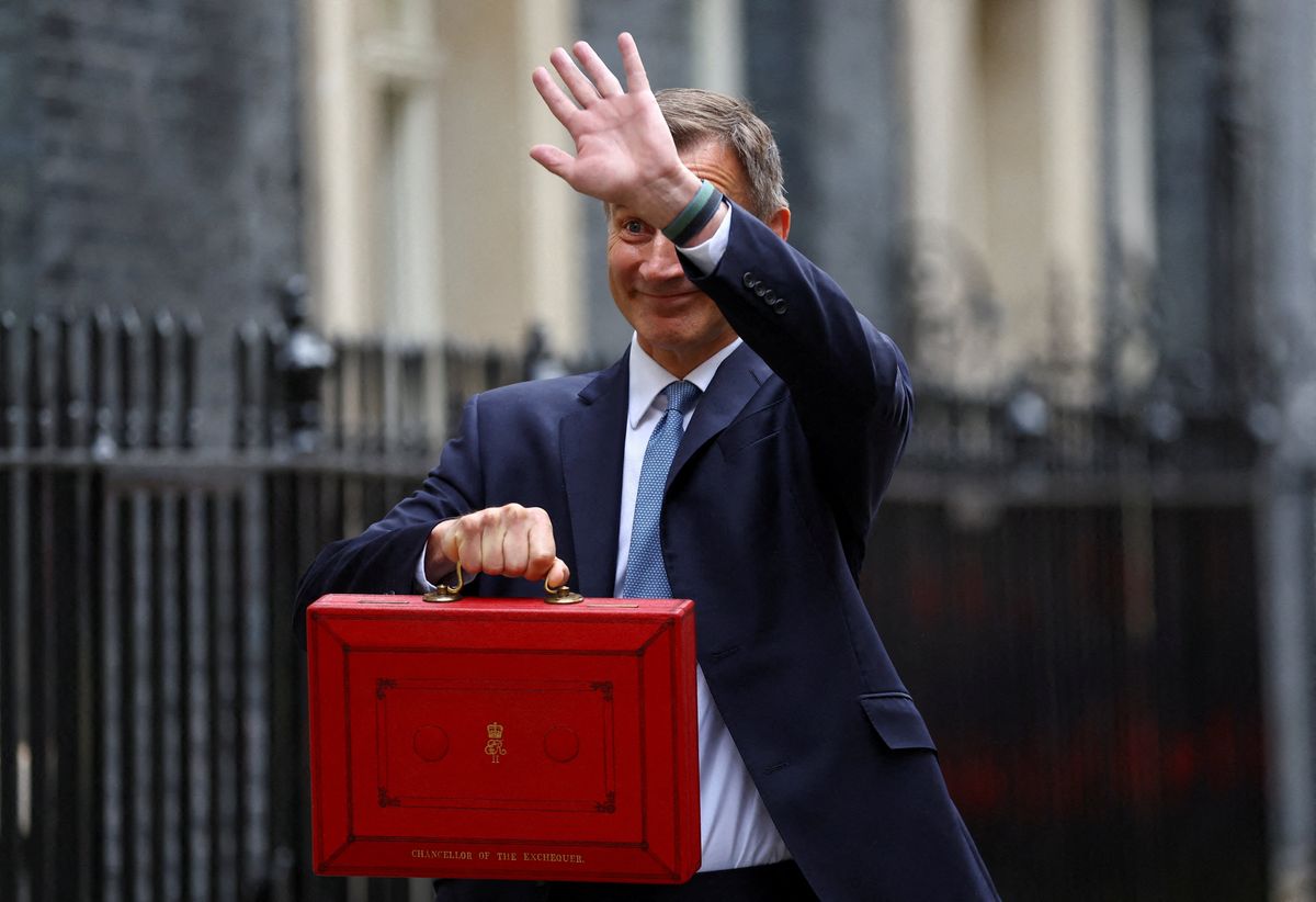 Britain's Chancellor of the Exchequer Jeremy Hunt poses with the budget box at Downing Street in London, Britain March 15, 2023.