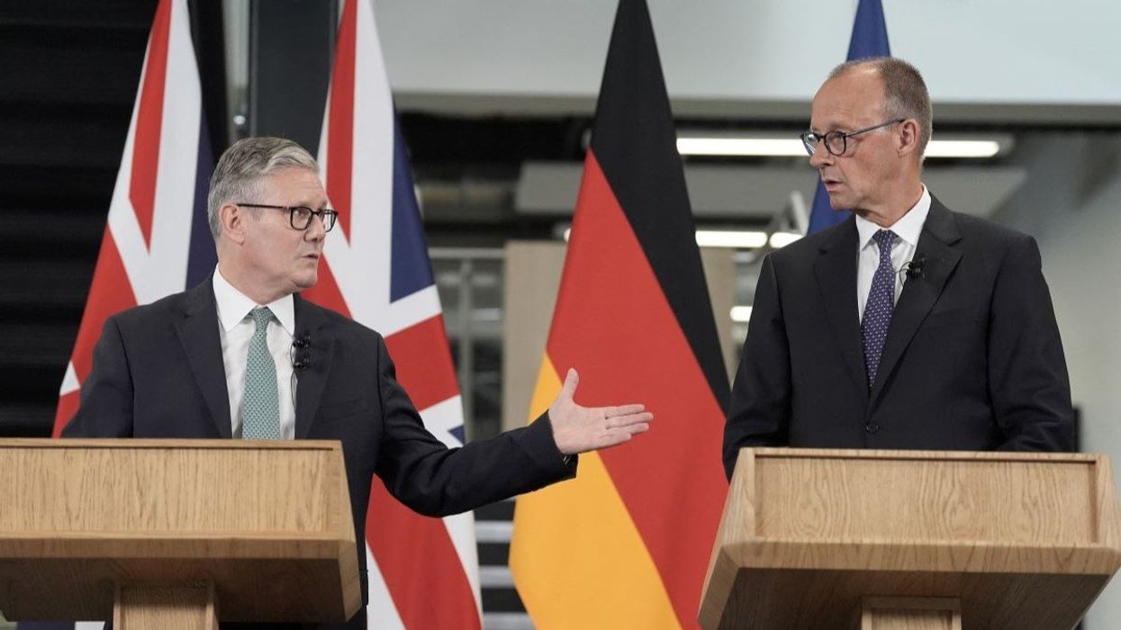 Britain's Prime Minister Keir Starmer and German Chancellor Friedrich Merz hold a press conference during a visit to the Airbus factory in Stevenage, Hertfordshire, Britain, July 17, 2025.