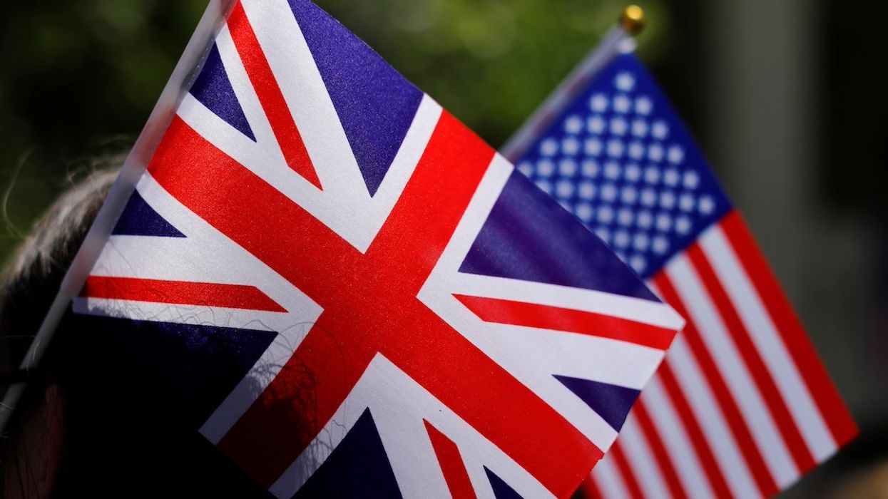 British and American flags she takes part in a 'Here's to Meghan!' celebration ahead of her marriage to Prince Harry, as they celebrate at Immaculate Heart High School in Los Angeles, California, U.S., May 15, 2018.