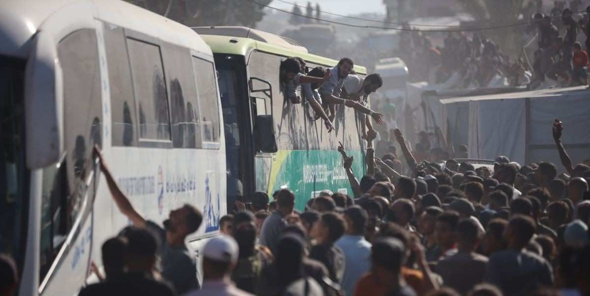 ​Buses carrying Palestinians released from Israeli prisons under a Gaza ceasefire and hostage exchange deal with Palestinian factions arrive outside the Nasser hospital in Khan Yunis, Gaza Strip, on October 13, 2025. 