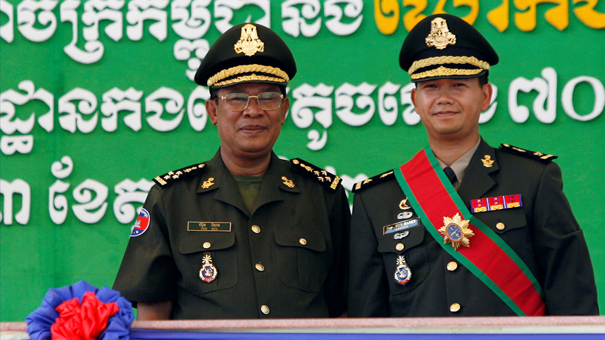 Cambodia's Prime Minister Hun Sen poses with his son Hun Manet near the capital, Phnom Penh.