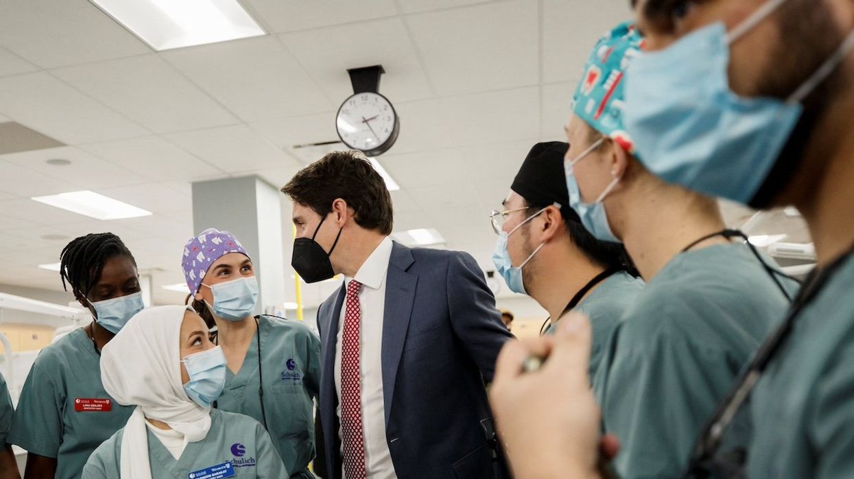 Canada's Prime Minister Justin Trudeau greets dental students during his visit to the Schulich School of Medicine and Dentistry in London, Ontario, Canada, December 1, 2022.