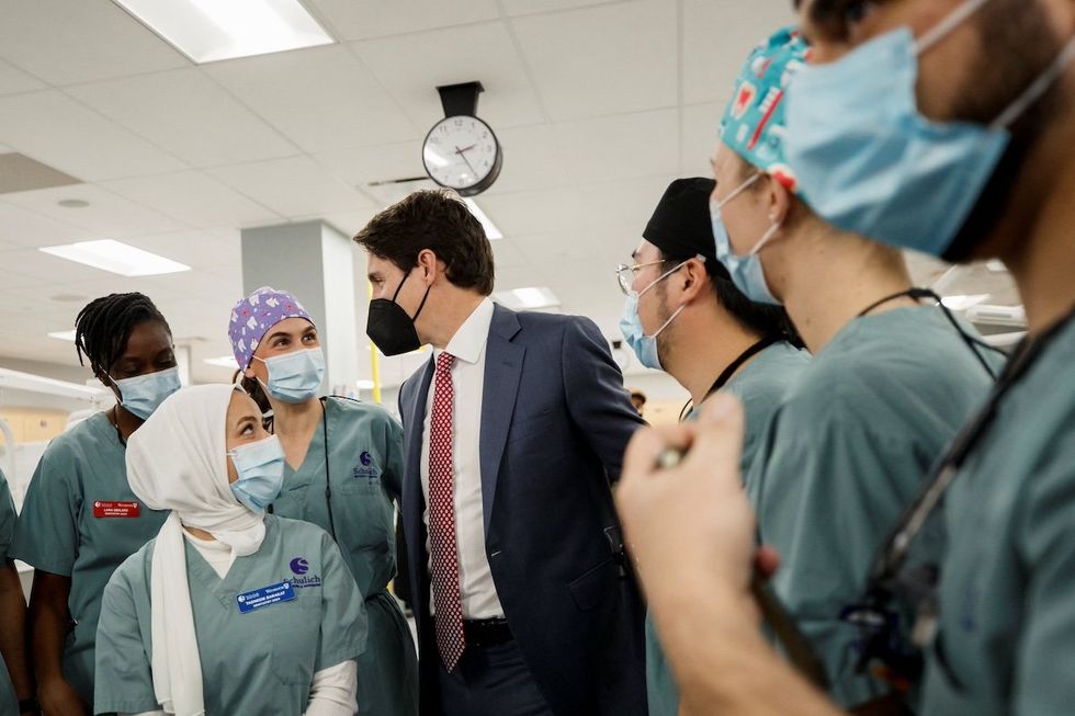 Canada's Prime Minister Justin Trudeau greets dental students during his visit to the Schulich School of Medicine and Dentistry in London, Ontario, Canada, December 1, 2022.
