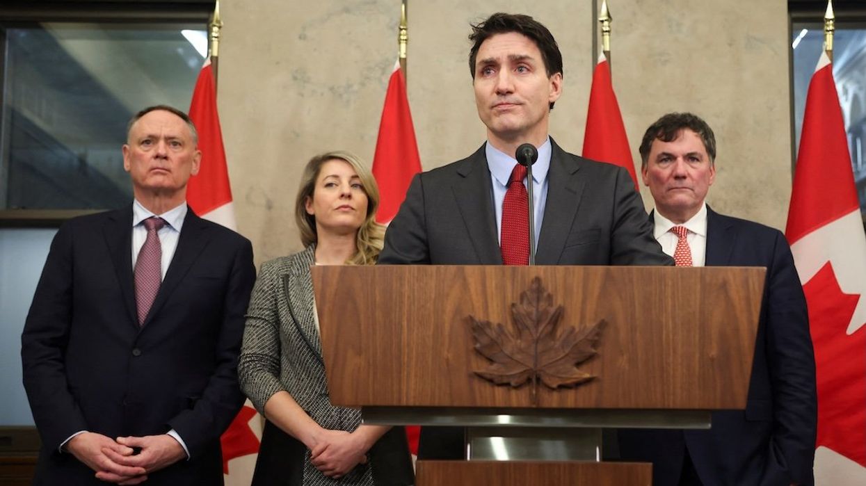 Canada's Prime Minister Justin Trudeau is joined by Finance Minister Dominic LeBlanc, Minister of Foreign Affairs Melanie Joly, and Minister of Public Safety David McGuinty, as he responds to President Donald Trump's orders to impose 25% tariffs on Canadian imports, in Ottawa, Ontario, on Feb. 1, 2025.