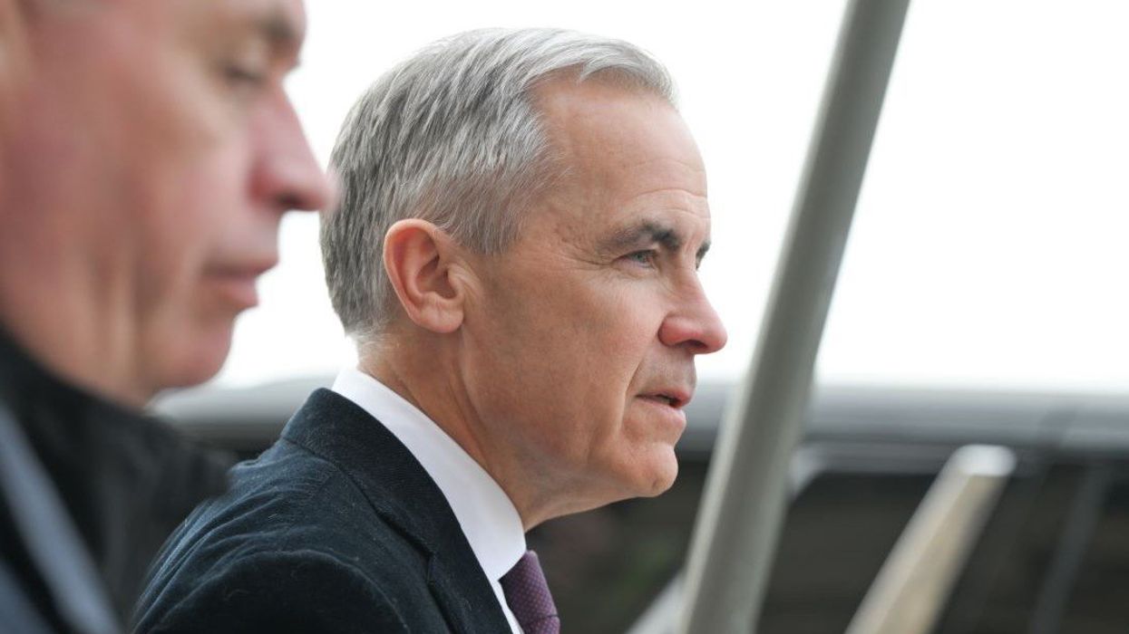 Canada's Prime Minister Mark Carney leaves his office on Parliament Hill after his second day in office, on April 30, 202.