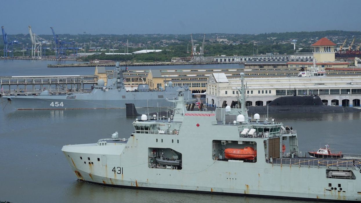 Canadian navy patrol boat HMCS Margaret Brooke passes by Russian nuclear-powered cruise missile submarine Kazan and frigate Admiral Gorshkov, as it enters Havana’s bay, Cuba, June 14, 2024.